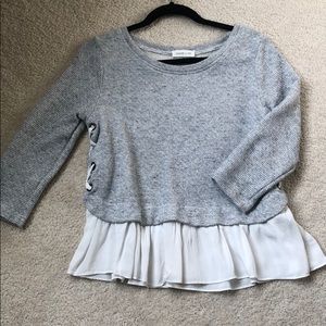 Women’s top with side detail and ruffle